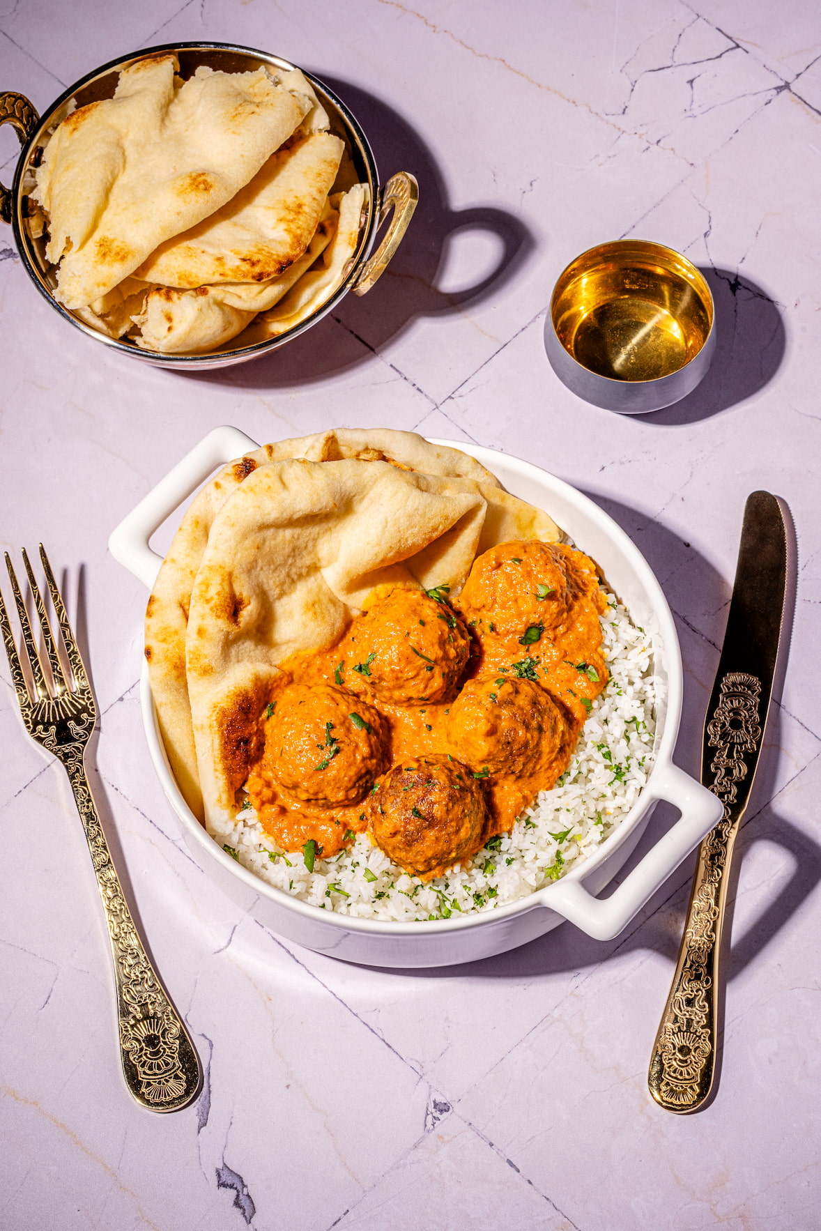 Boulettes façon poulet au beurre nappées d'une sauce crémeuse aux épices indiennes