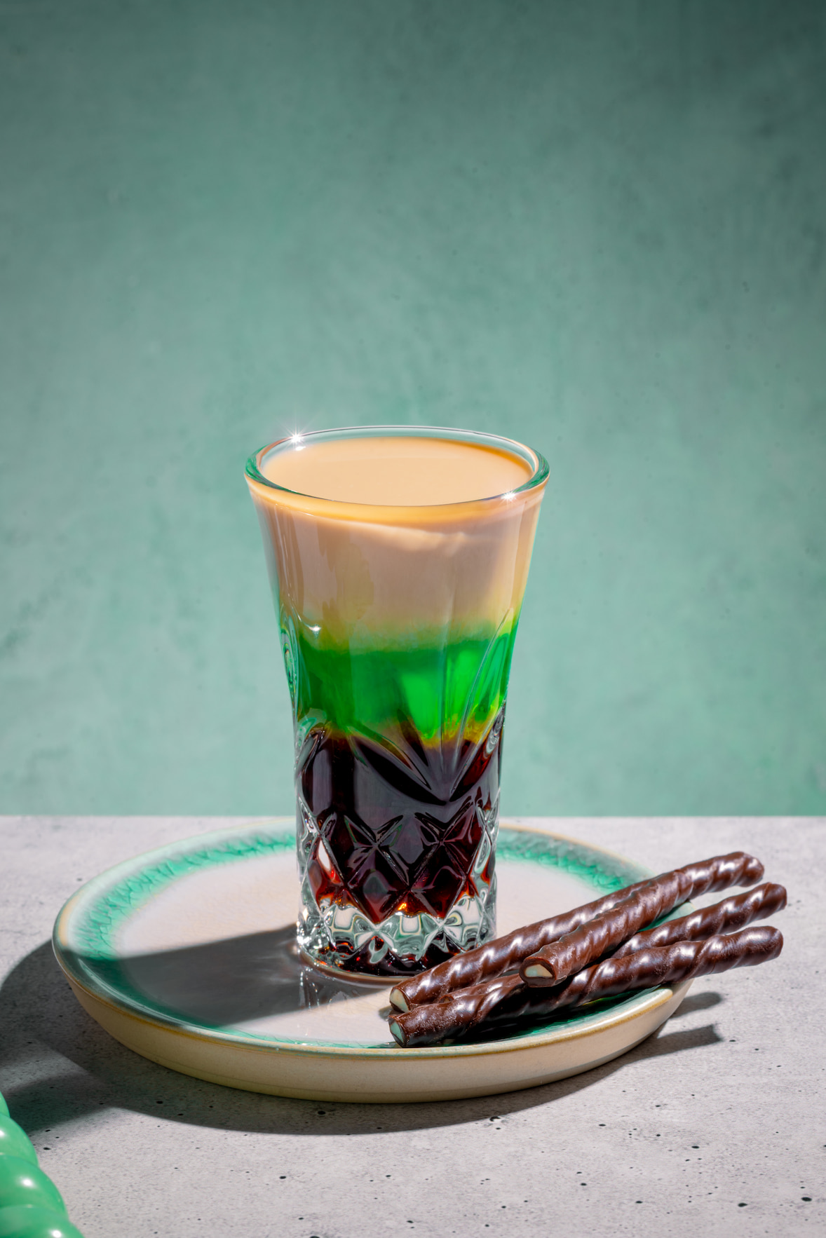 Shooter After Eight à trois étages café menthe et crème dans un verre shooter