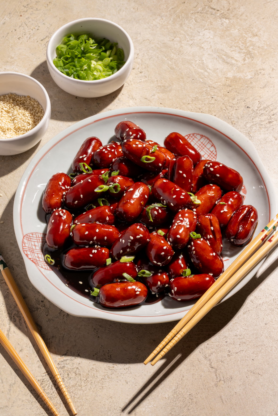 Saucisses cocktail asiatiques teriyaki maison nappées de sauce collante