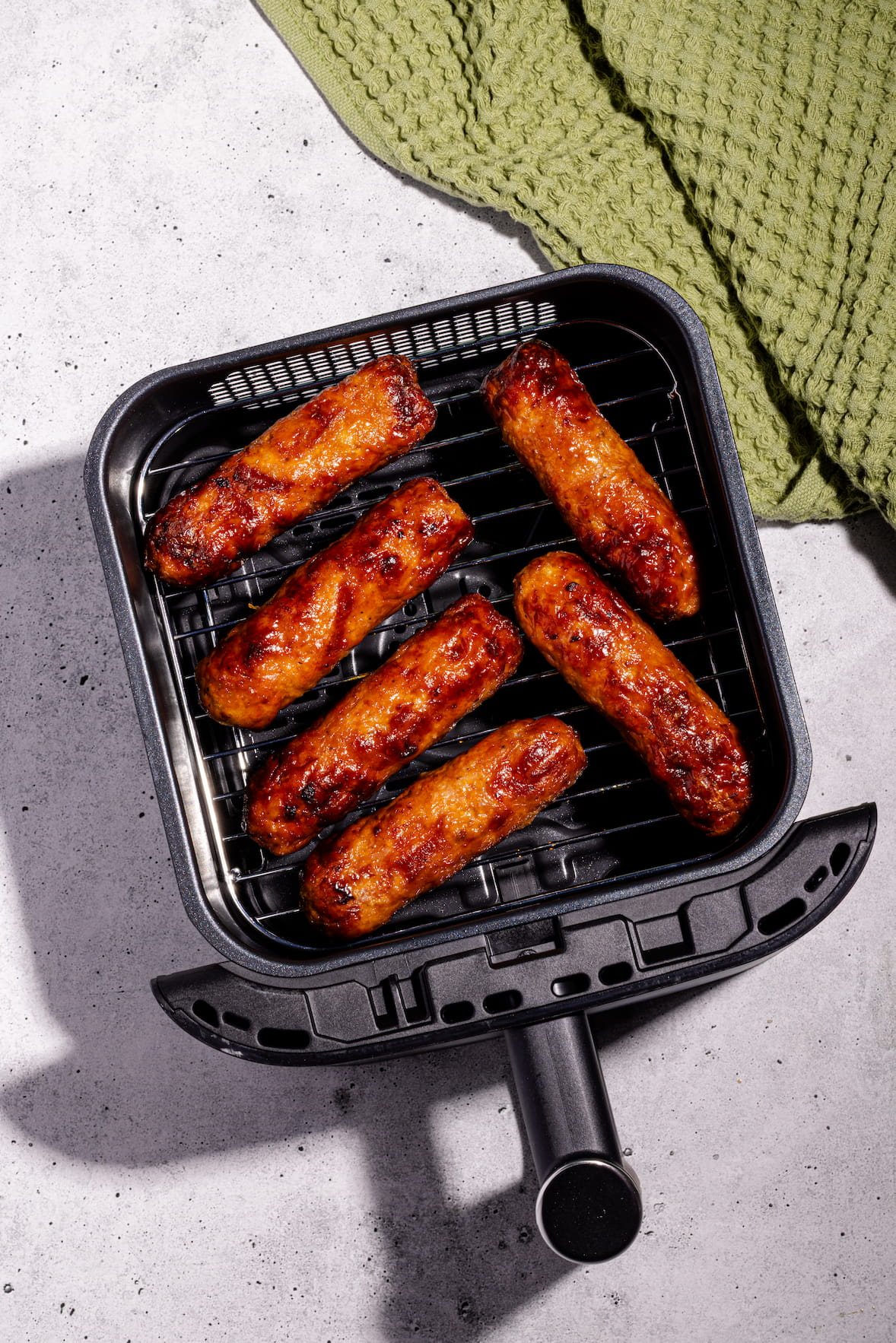 Saucisses italiennes au air fryer bien dorées avec cuisson rapide et croustillante